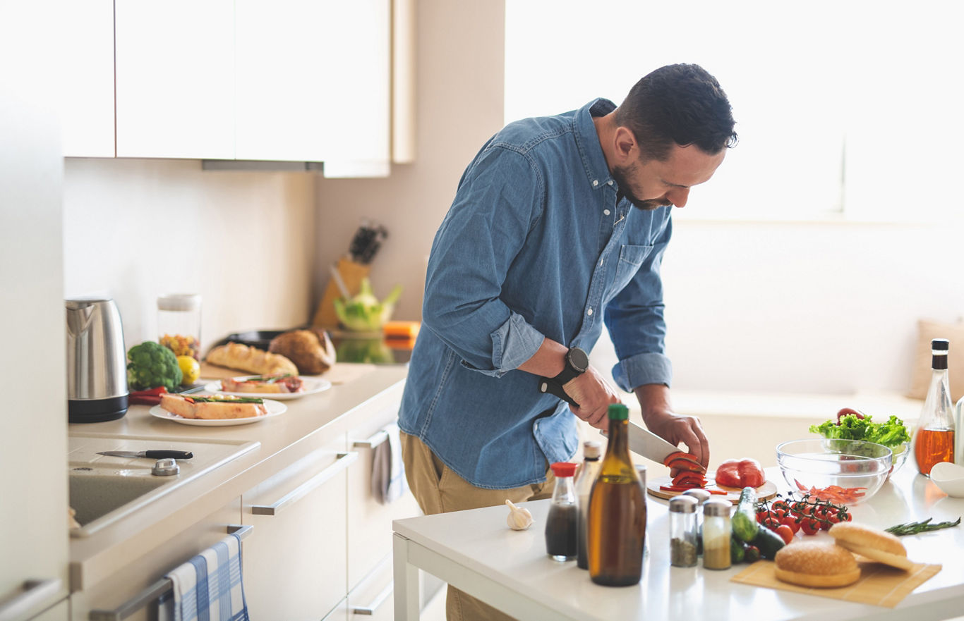 Man Cooking in Kitchen | Blog | Greystar